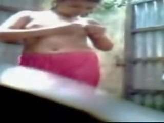 Bengali damsel het nemen bad